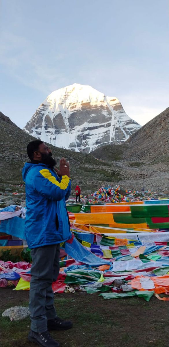 Man Standing in Front of Mt Kailash